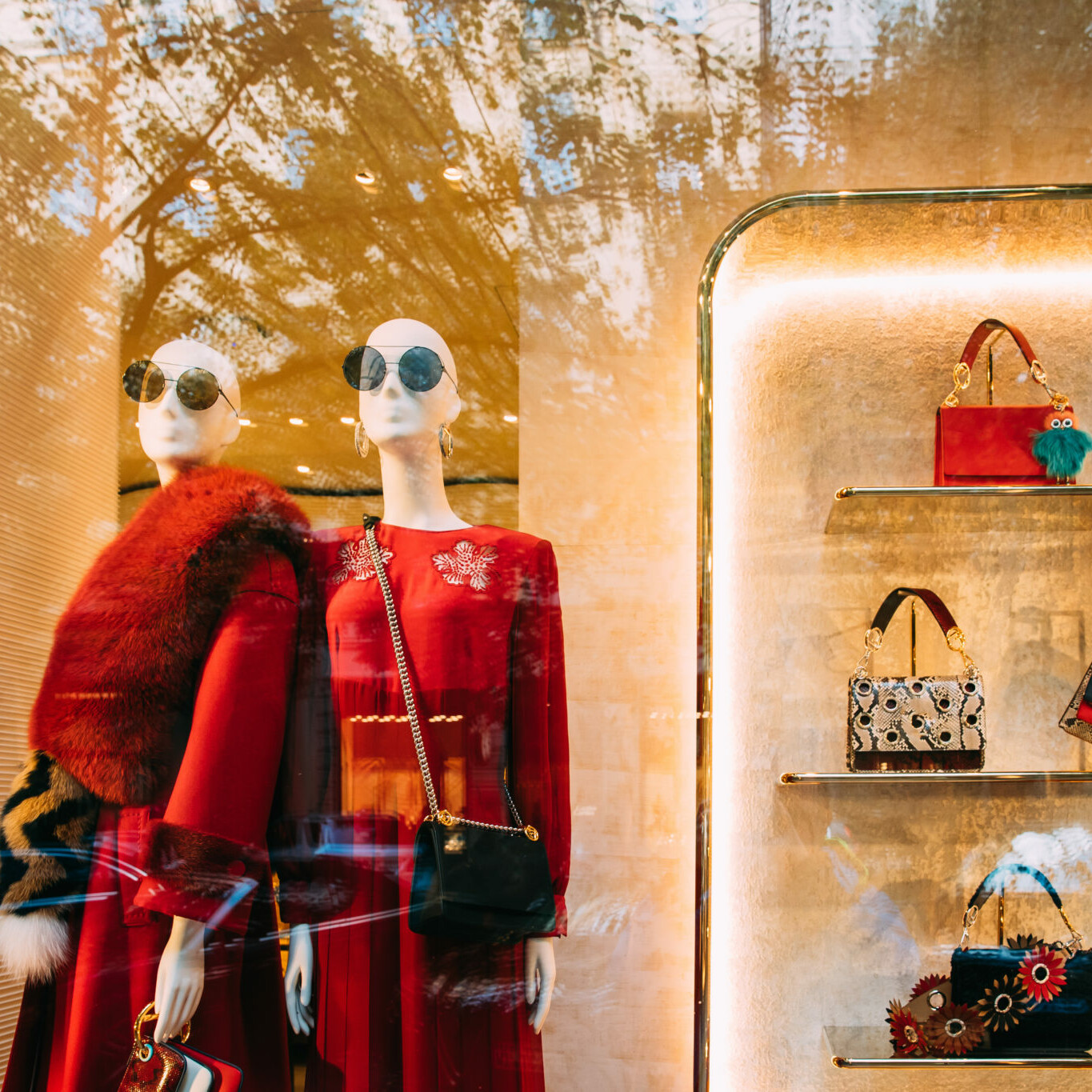 Female Mannequins And Fashion Accessories In Shop Window Showcase Of Store Mall Market.