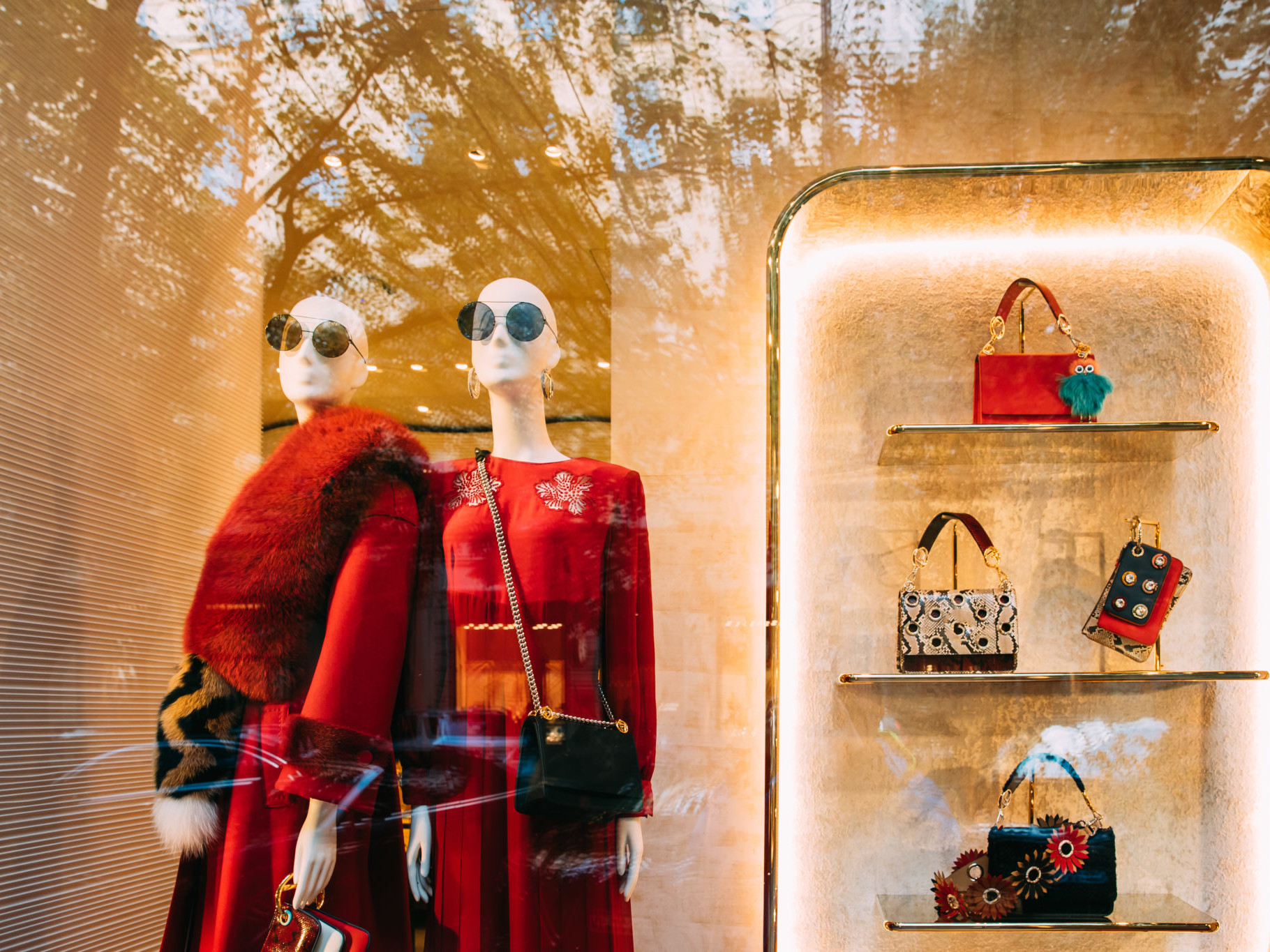 Female Mannequins And Fashion Accessories In Shop Window Showcase Of Store Mall Market.